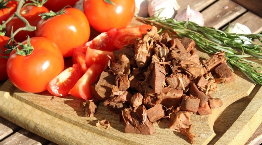 Cooking homemade dog food.